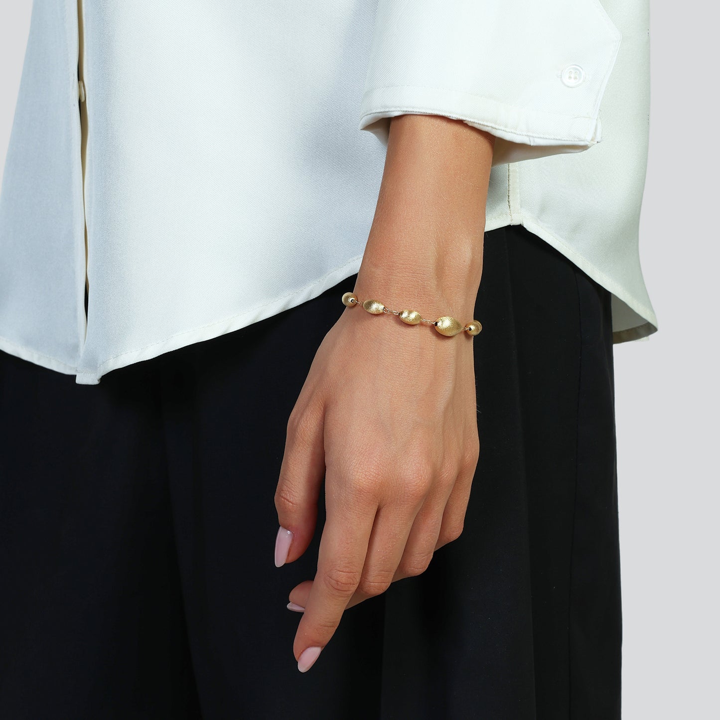 Bracciale in argento dorato satinato