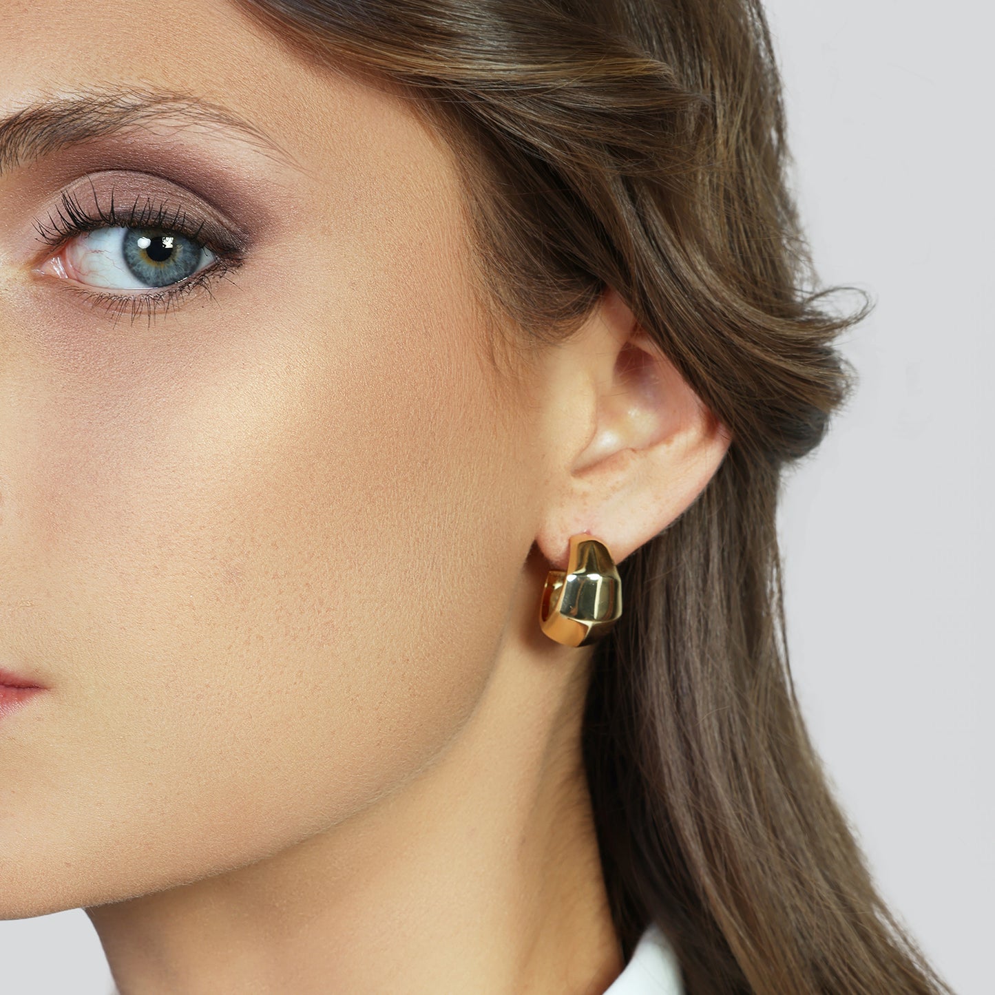 Orecchini semi-cerchio dorato