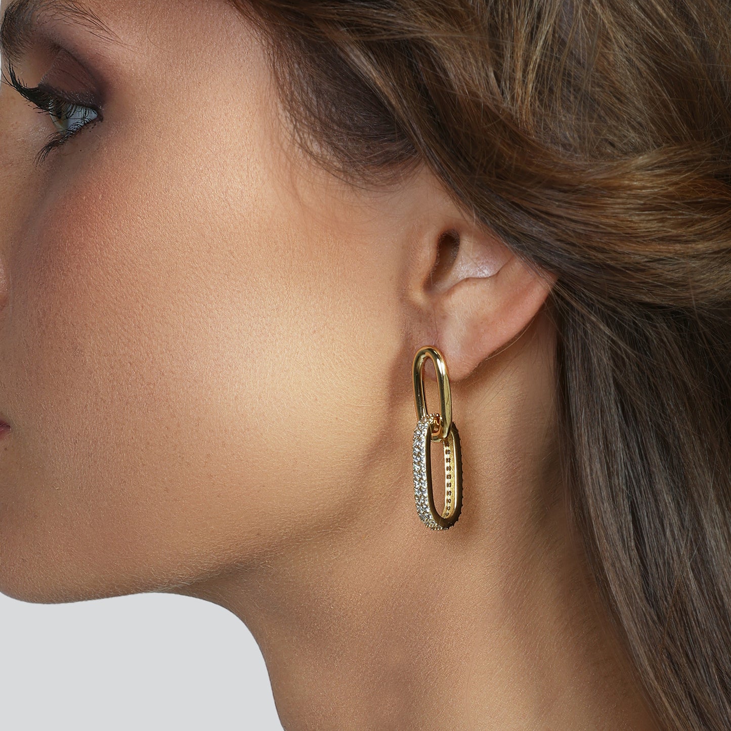 Orecchini catena con zirconi